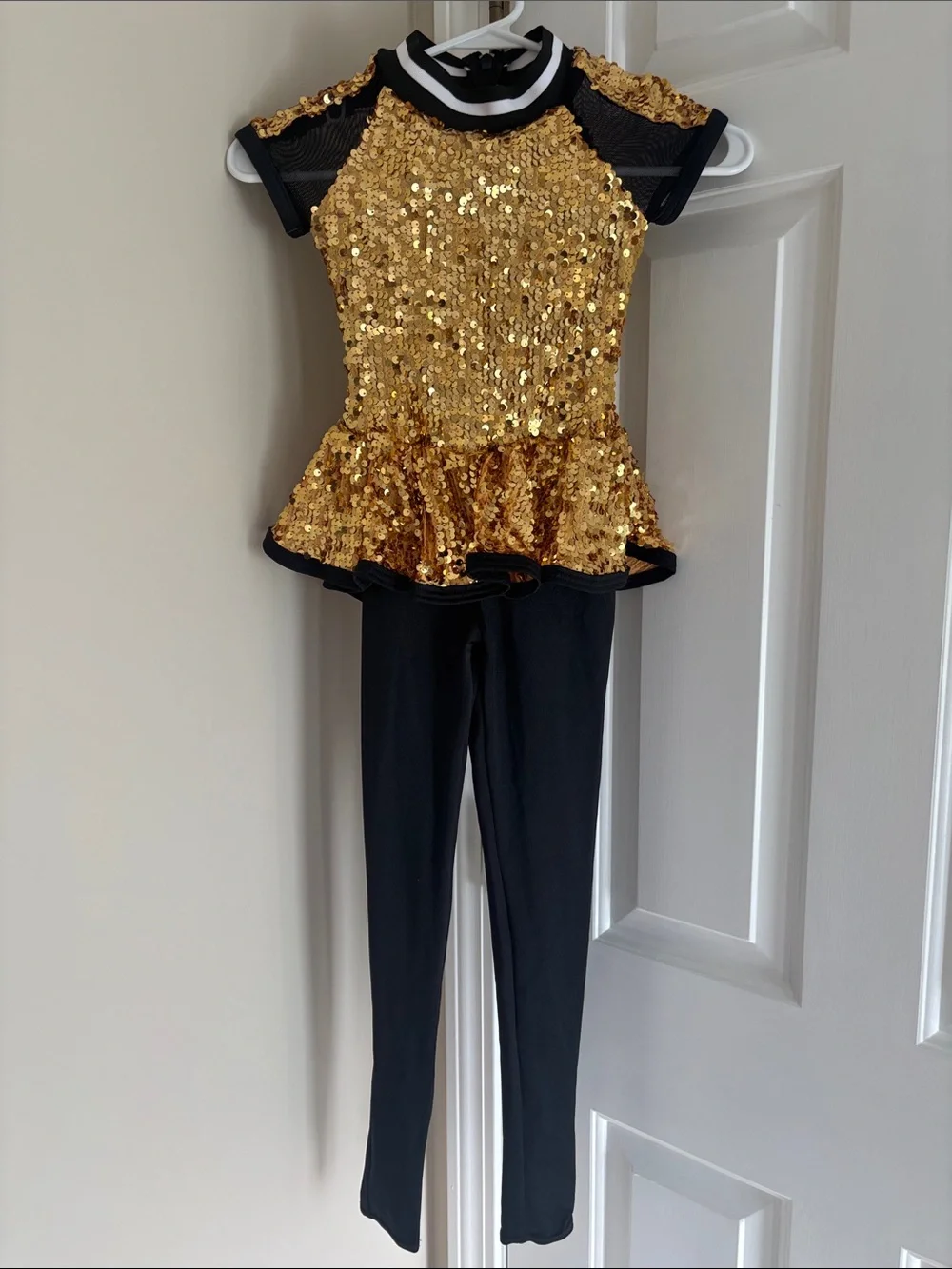 Weissman Gold Sequin Peplum Top with Black Leggings